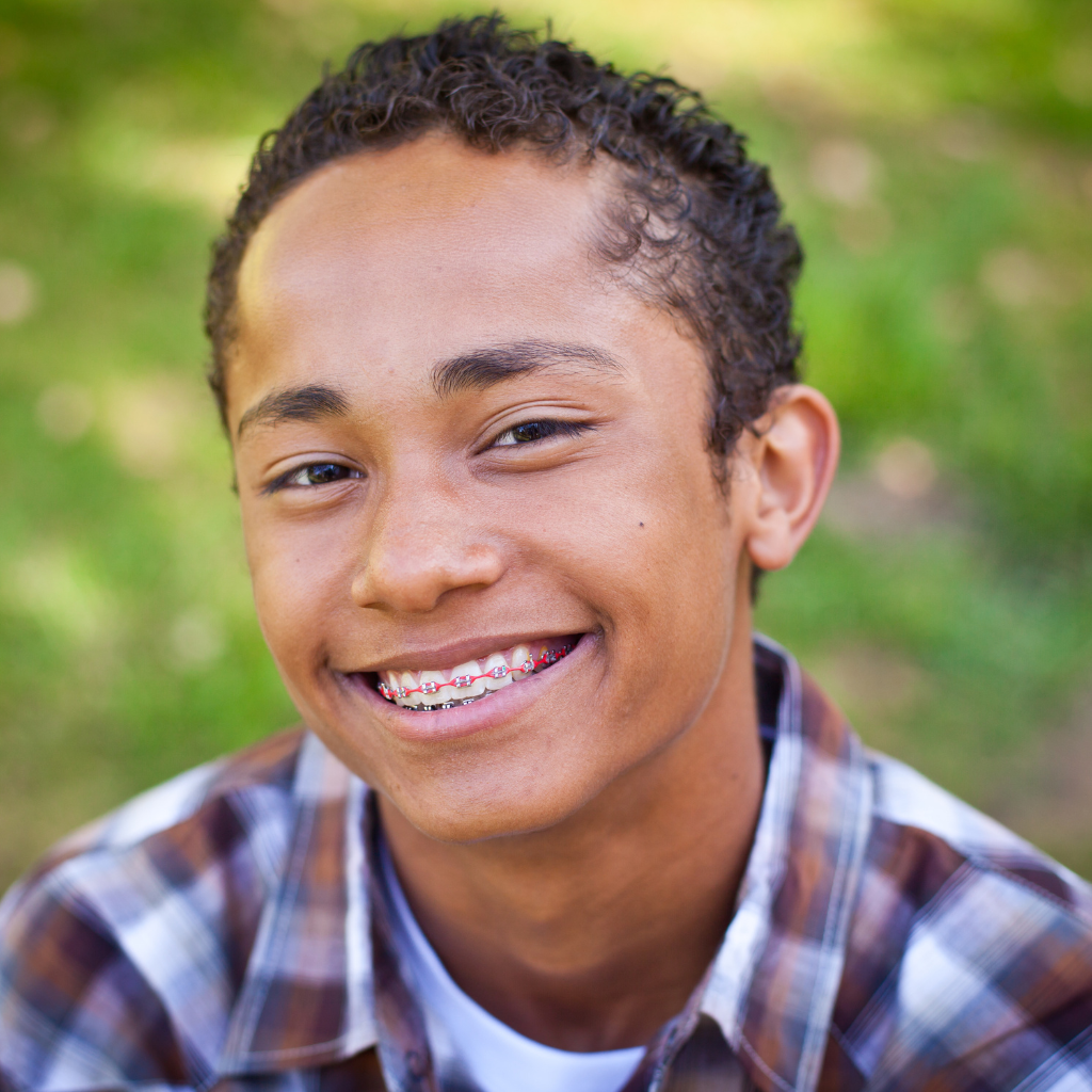 boy smiling with braces